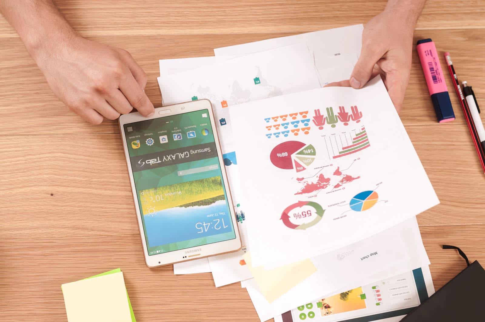 Small business owner reviewing bookkeeping records with an accountant