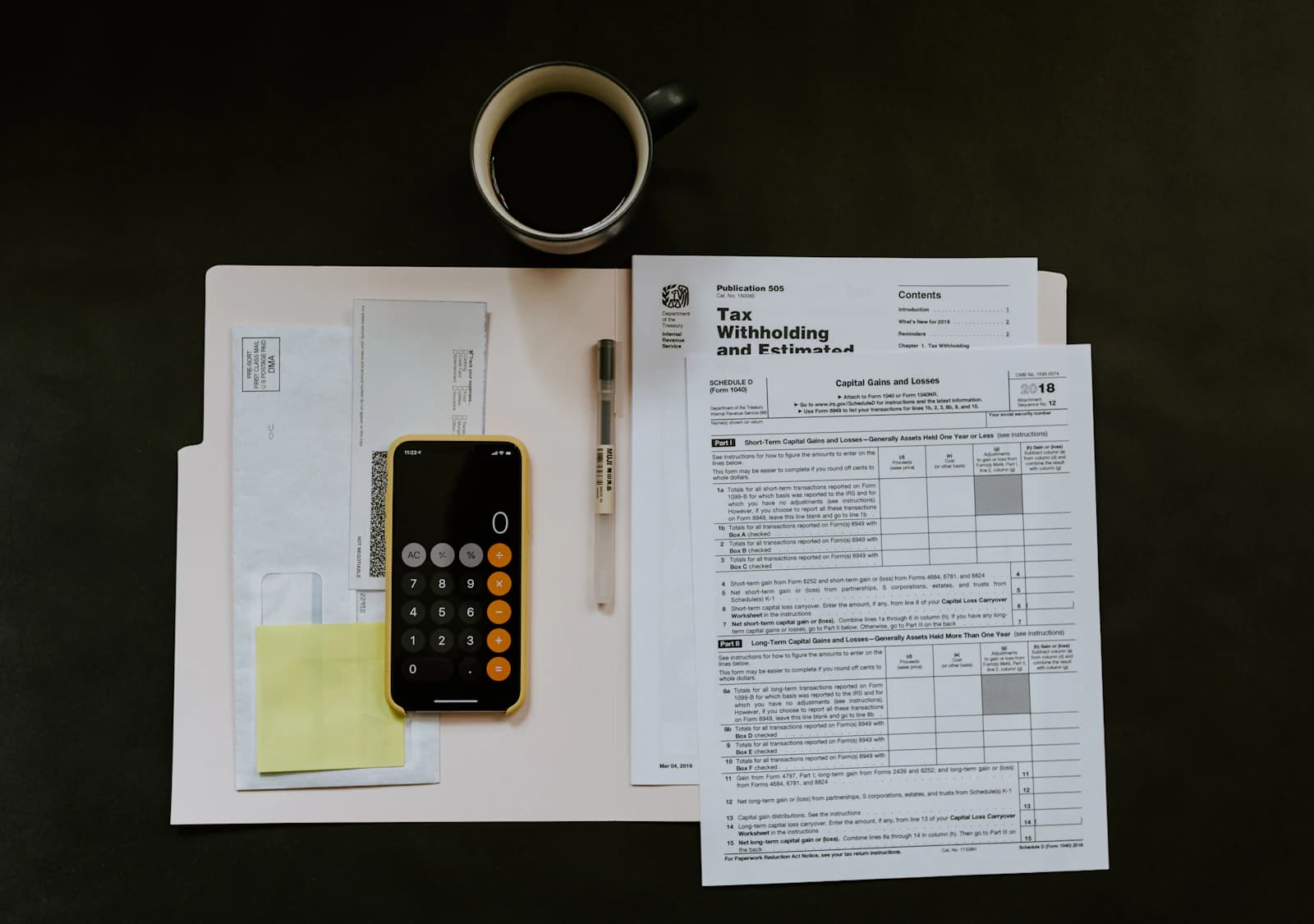 Accountant reviewing organized bookkeeping records and financial statements